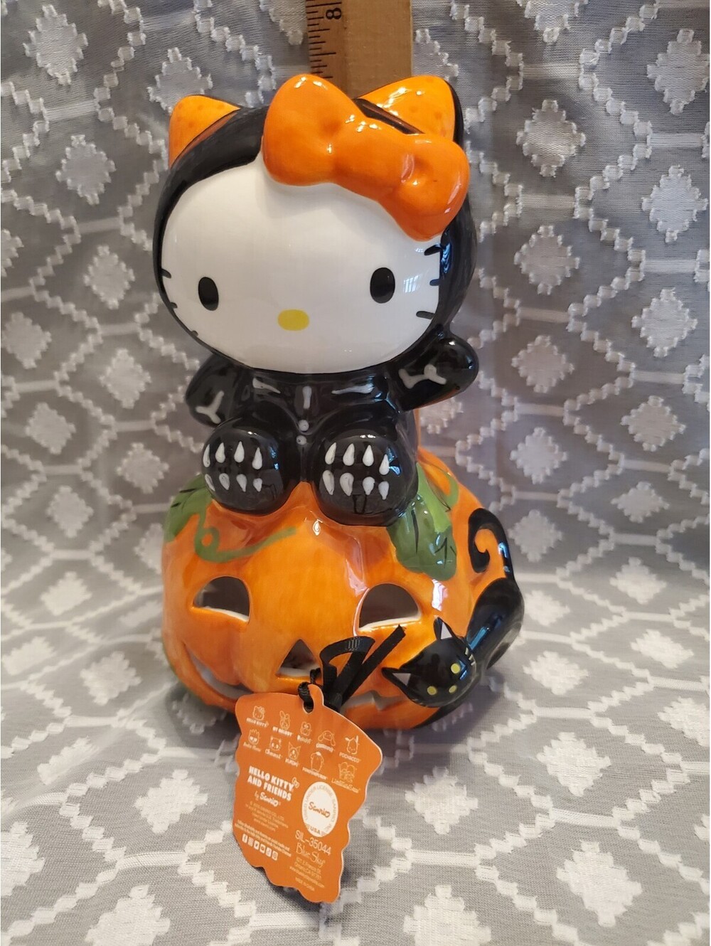 Halloween Hello Kitty Skeleton On A Pumpkin Votive
